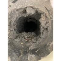 Clogged lint inside of a dryer vent